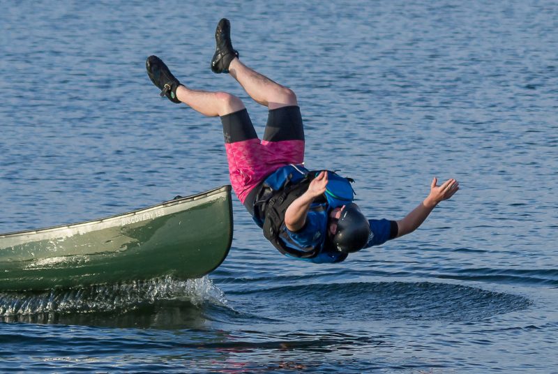 How Reliable is your Camera Brand? Man falling in water froma canoe.