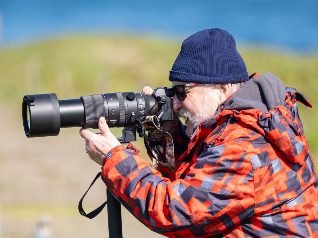 A photographer with a Sony camera.