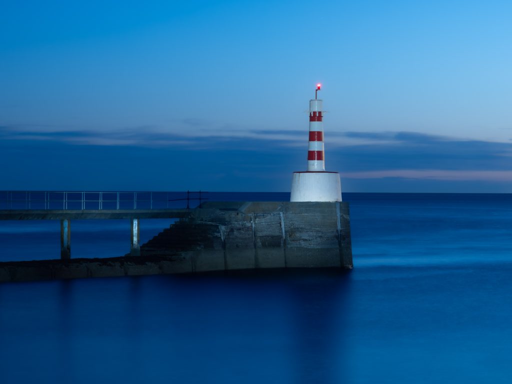 On Northumberland Photography Workshops and classes you will discover long exposure techniques like this port light beacon shot during the blue hour,