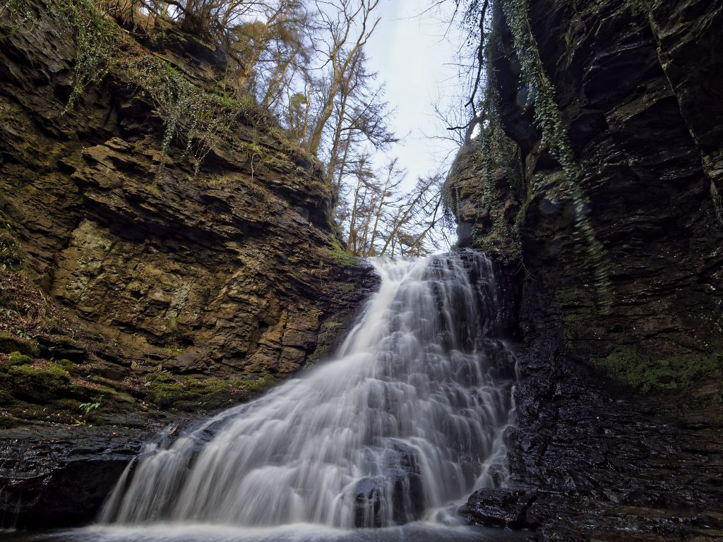 A High Resolution photo of Hareshaw Linn waterfall shot on a Northumberland photography workshop. Photographed using an OM System camera